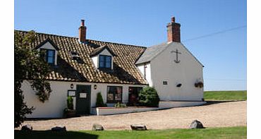 The small village of Sutton Gault is where you will find the beautiful Anchor Inn. It is a 17th century property that still retains the charm and warmth of the old.It specialises in providing quality rooms and fine award winning cuisine.Enjoy two d