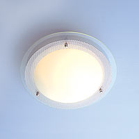 Porthole inspired styling in this chic light, Flus
