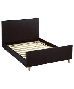 Wooden frame covered with chocolate coloured padded faux leather. Padded faux leather