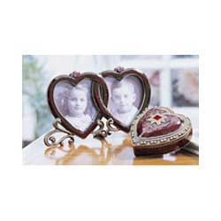 Our delightful pewter double frame will fit two 2in/5cm x 2in/5cm photographs