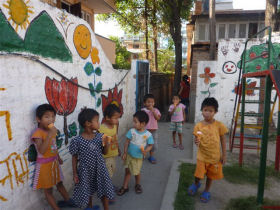 Unbranded Volunteer with children in Nepal
