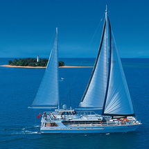 Experience the thrill of sailing on a 30-metre high-speed catamaran to a paradise Great Barrier Reef
