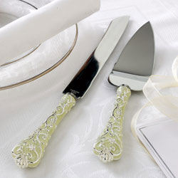 Stylish stainless steel knife and slice set with ornately engraved handles. Aged 16 and over only