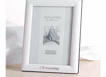 This simple but very effective Silver Plated White Christening 4 x 6 Photo Frame is the ideal gift and place to display a special memory from a little ones christening.The outside of the photo frame is finished with silver plate which has then has be
