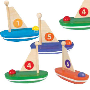 Smart little sailing boats made completely out of wood. Painted in an array of bright colours, with 