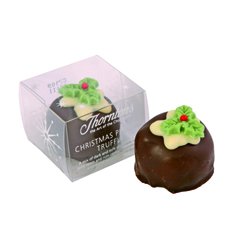Christmas pudding truffle centre with brandy and seasonal flavours, topped with a sprig of marzipan 